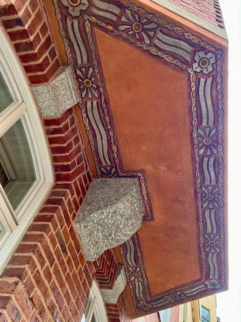 Art Nouveau mural paint underneath bay windows at Lutzengatan in Stockholm