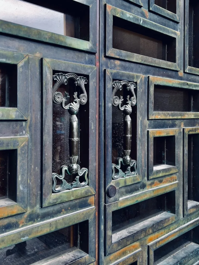 Iron cast door to main entrance of Stockholm Concert Hall with decorative details representing Swedish Grace style